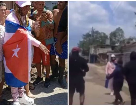 Rapero Tekashi 6ix9in se pasea por las calles de Pinar del Río envuelto en una bandera cubana