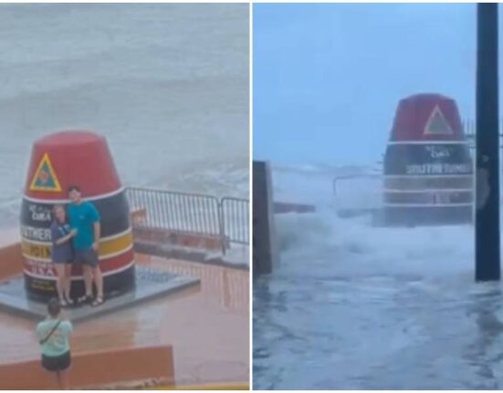 turistas en la boya de Key West-huracán Helene